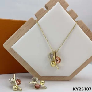Gold pendant necklace with peach and crystal accents and matching earrings, Fashion jewelry NYC